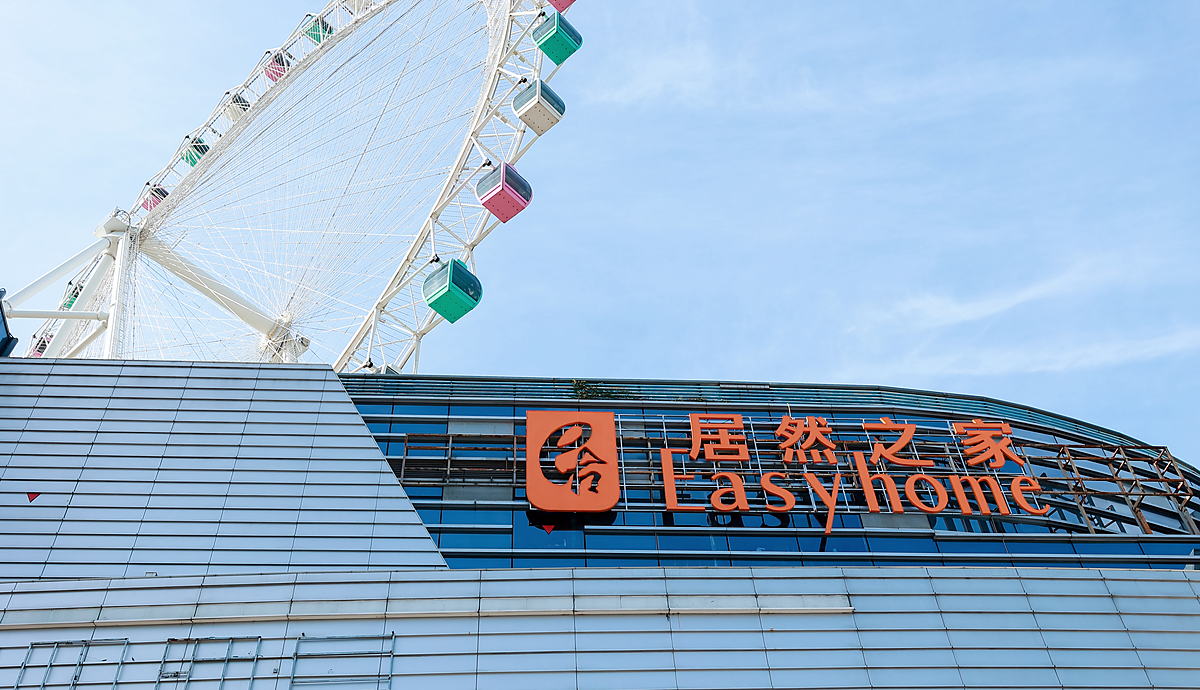 The Easyhome facade with the rooftop Ferris wheel behind it.